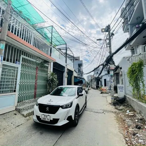 Nhà 4 tầng hẻm xe hơi 803 Huỳnh Tấn Phát 7m x 17m