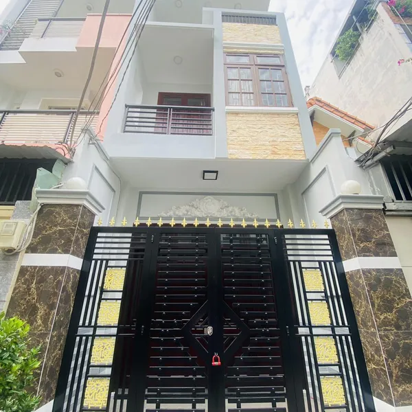 Nhà 4 tầng hẻm xe hơi 803 Huỳnh Tấn Phát 4m x 16m