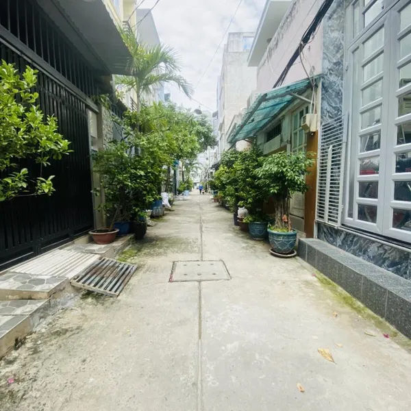 Nhà 4 tầng hẻm xe hơi 803 Huỳnh Tấn Phát 4m x 16m