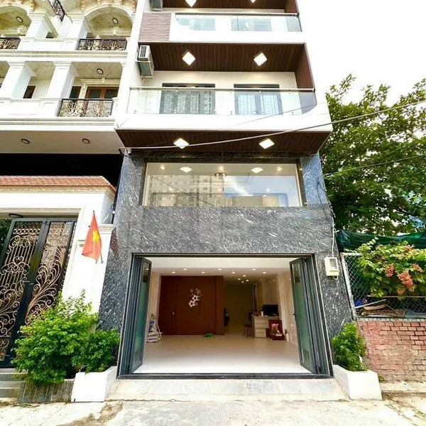 Nhà 5 tầng hẻm xe hơi Huỳnh Tấn Phát 5,5m x 14m